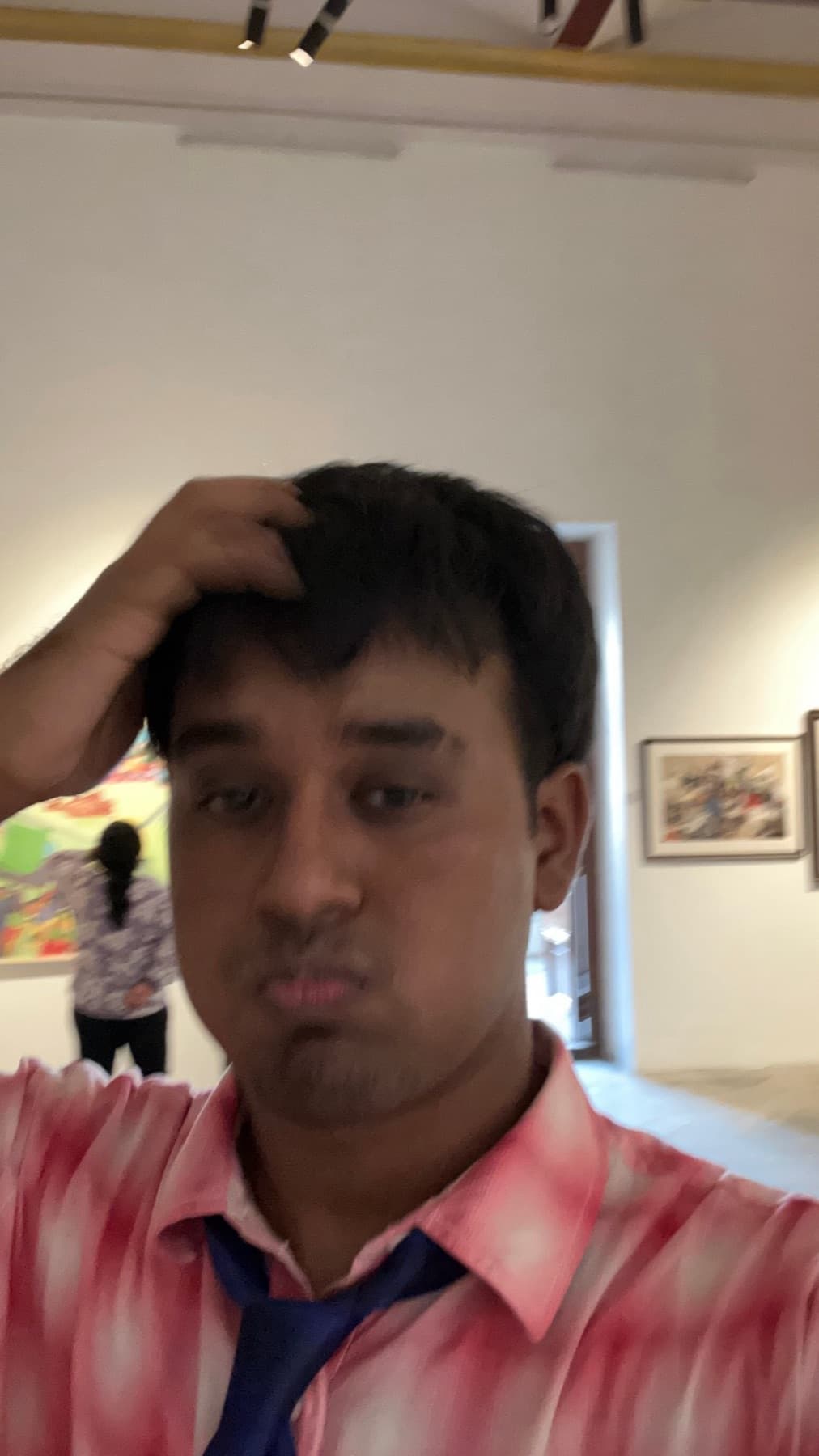 Roshan, selfie in a gallery